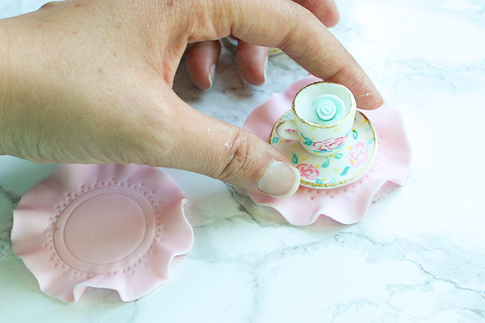 Teacup Cupcake Topper - press teacup and saucer onto wet doily